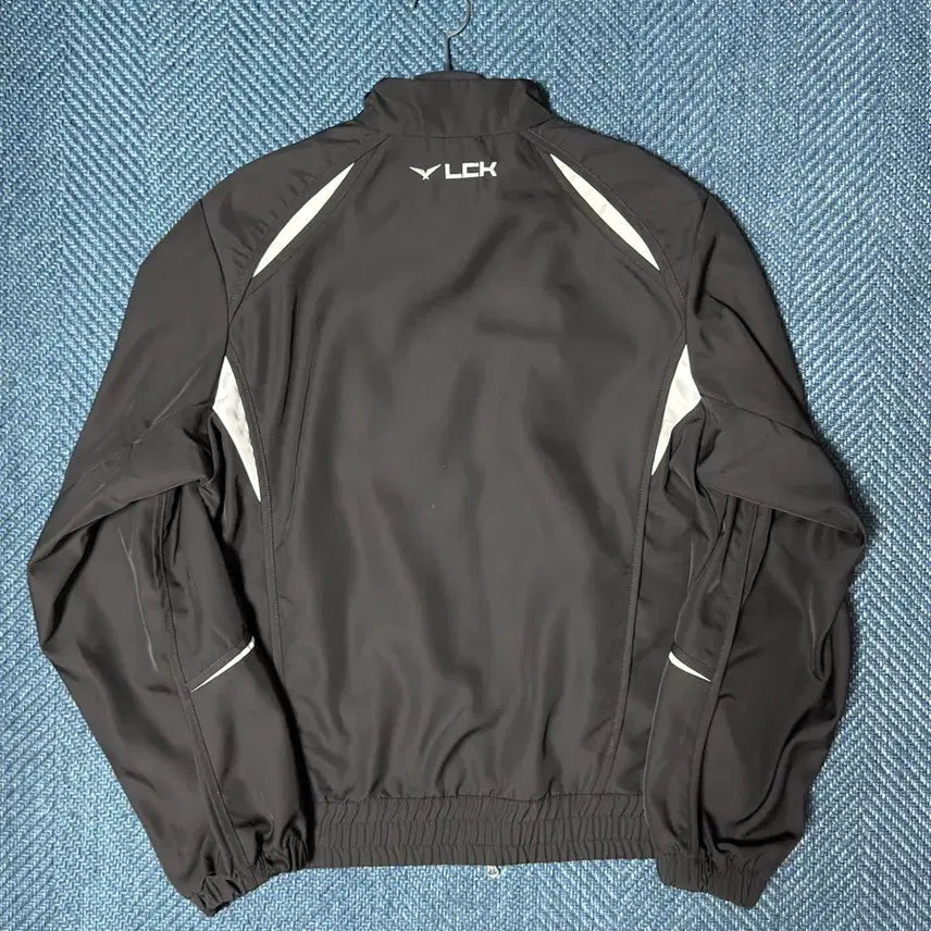 [BUNJANG] T1 2026 LCK Uniform Jacket Black ver.2 (Non-Marking) / T1 2026 LCK 유니폼 자켓 블랙 ver2 (논 마킹 버전) L