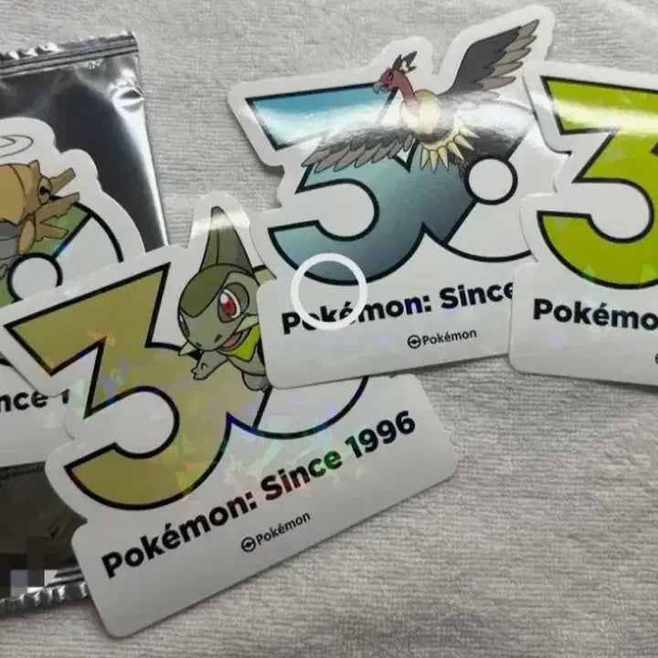 [BUNJANG] Pokemon 30th Anniversary Logo Sticker 10-Pack Bundle (Sealed + 4 Unsealed) / 포켓몬 30주년 로고 스티커 10팩 미개봉 + 개봉4장