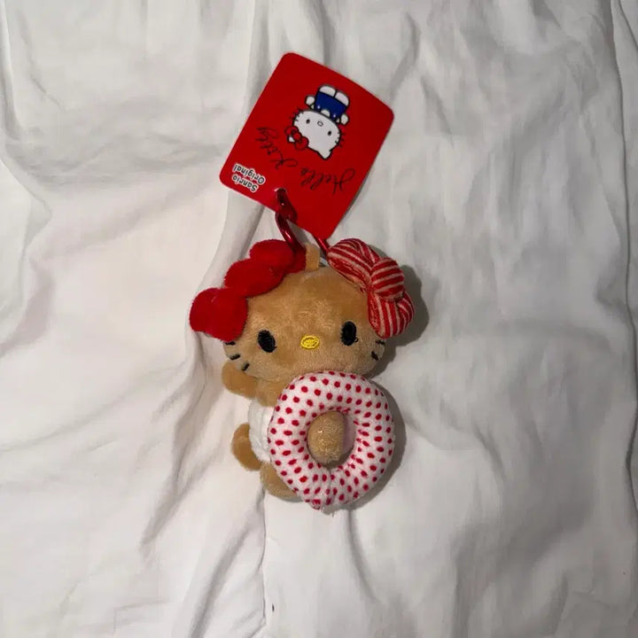 [BUNJANG] Sanrio Hello Kitty Tanning Kitty Tube Plush Keychain / 산리오 헬로키티 키티 태닝키티 튜브 인형 키링 새상품