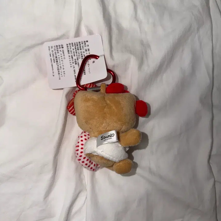 [BUNJANG] Sanrio Hello Kitty Tanning Kitty Tube Plush Keychain / 산리오 헬로키티 키티 태닝키티 튜브 인형 키링 새상품