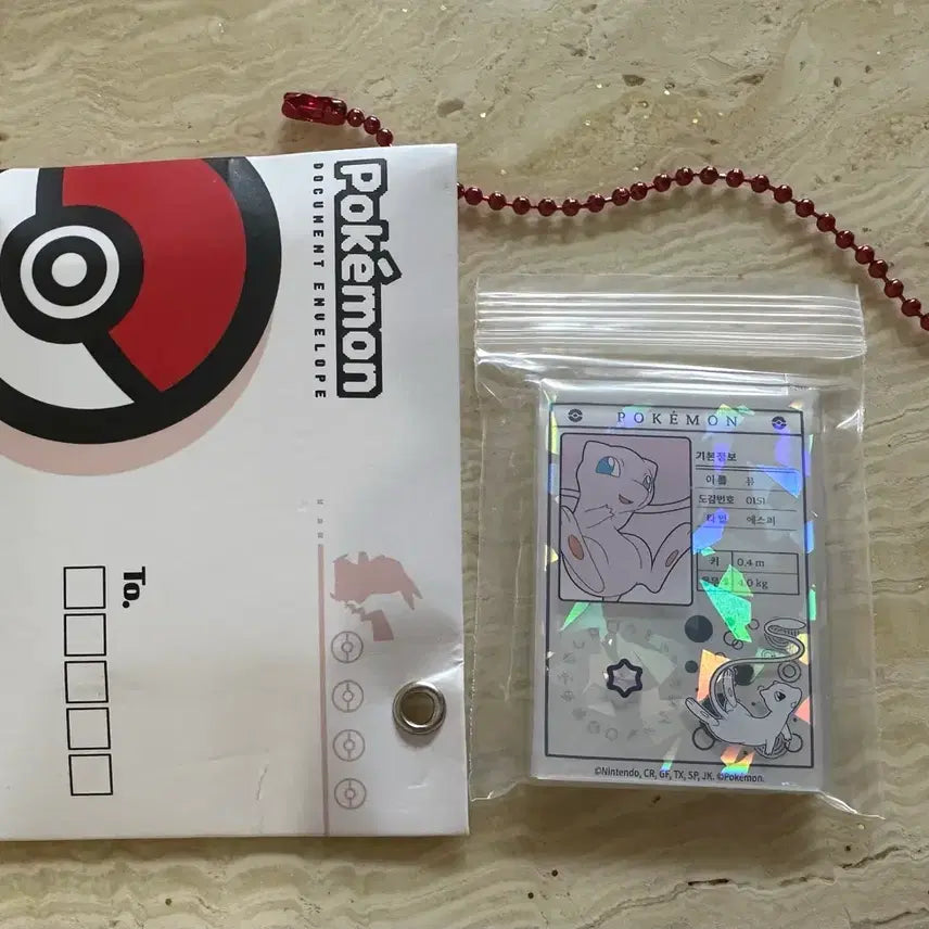 [BUNJANG] Lotte World Pokemon Mew Introduction Booklet Magnet Keychain / 롯데리아 포켓몬스터 뮤 소개서 마그넷 자석 키링