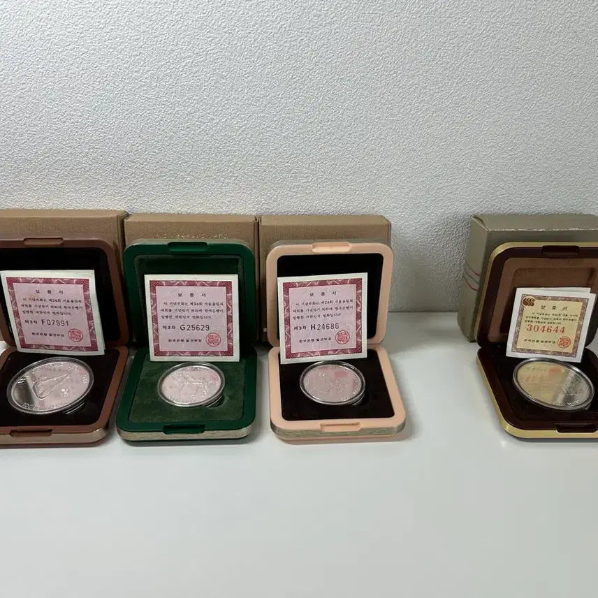 [BUNJANG] 1988 Seoul Olympics Proof Commemorative Silver Coins (1st-3rd Series) &amp; 1986 Seoul Asian Games Proof Commemorative Silver Coin / 1988 서울올림픽 프루프 기념은화 1~3차 + 1986 서울아시안게임 프루프 기념은화 (보증서 포함)