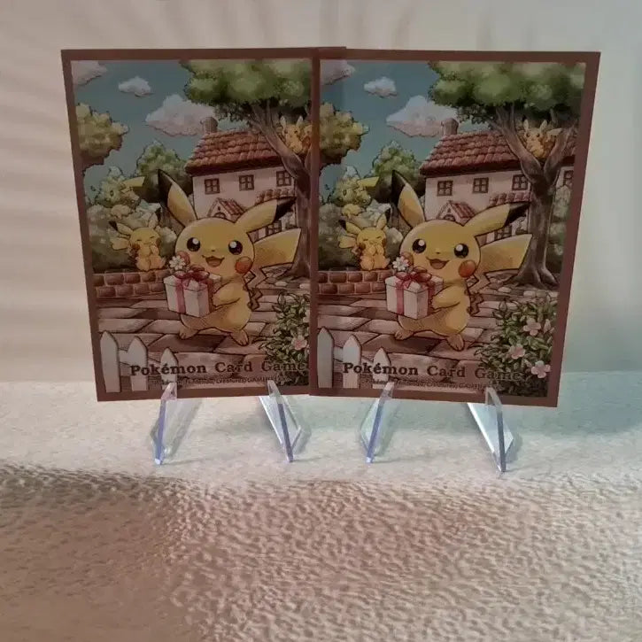 [BUNJANG] Pokemon Card "Gift Pikachu" "Illustration Sleeve" Set (2 pcs) / 포켓몬 카드 "선물 파카츄" "일러스트 슬리브" 2장 소량판매