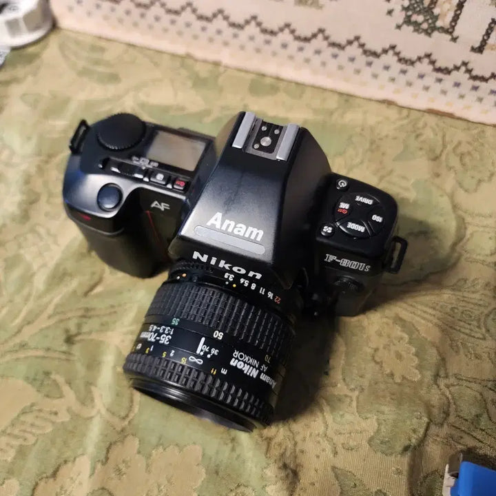 [BUNJANG] Anam Nikon F-801s Film Camera with AF Nikkor 35-70mm F3.3-4.5 Lens (1991) / 1991년에 출시된 아남 니콘 F-801s(Anam Nikon F-801s) 필름 카메라와 AF Nikkor 35-70mm F3.3-4.5 렌즈 건전지 뚜껑 없어요 카메라 대해서