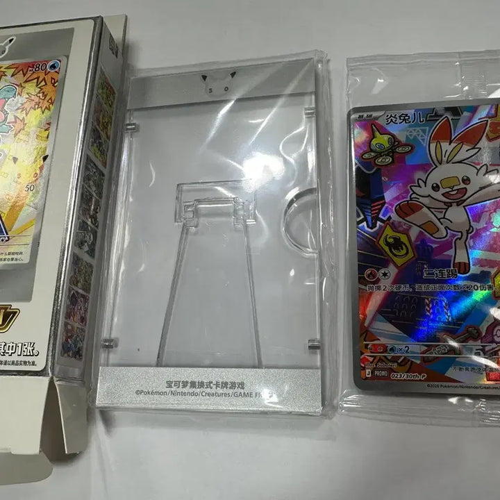 [BUNJANG] Pokemon 30th Anniversary First Partner Promo Card Bundle Set (5 Types) / 중국 포켓몬 카드 30주년 퍼스트파트너 프로모 카드+거치케이스 도치마론. 염버니. 쥬리비안. 개구마르. 냐오하 5종일괄