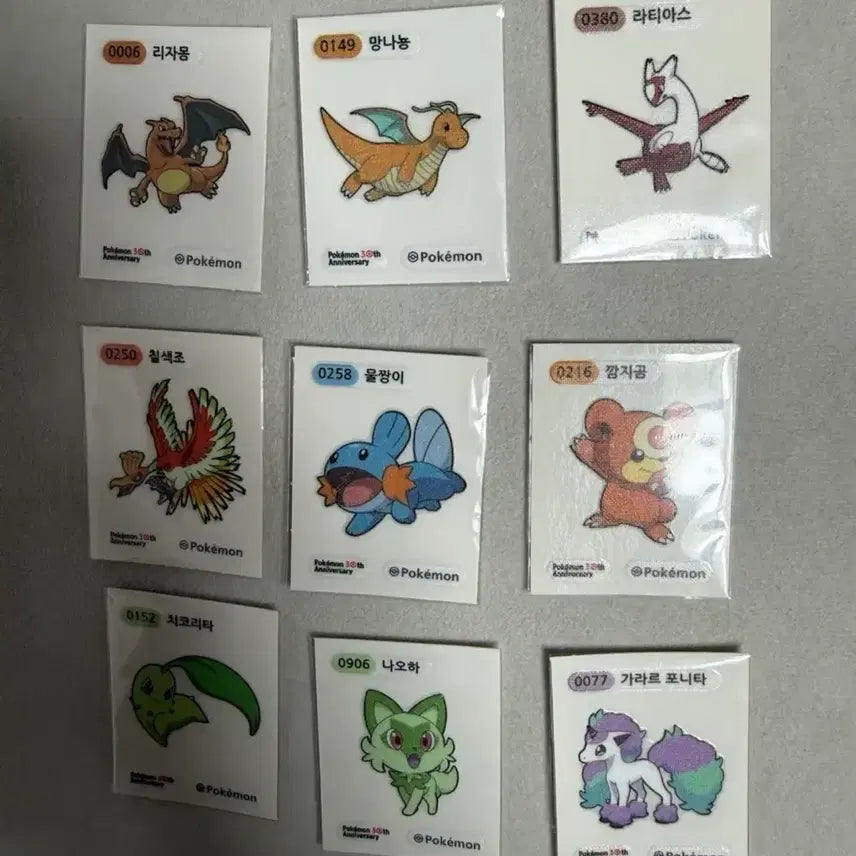[BUNJANG] 30th Anniversary Pokemon TCG Stickers - Charizard, Dragonite, Latias, Ho-Oh, Mudkip, Snorunt, Sprigatito / 30주년 포켓몬 띠부씰 리자몽 망나뇽 라티어스 칠색조 물짱이 깜지곰 나오하