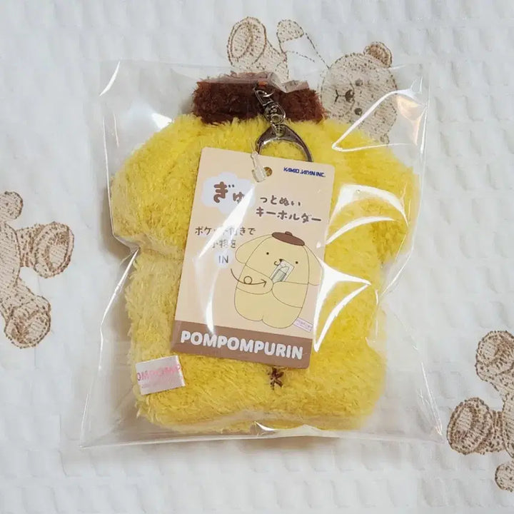 [BUNJANG] Sanrio Pompompurin Hugging Pocket Mascot Keychain / 할인! 산리오 끌어안는 주머니 폼폼푸린 마스코트 키링 팝니다.