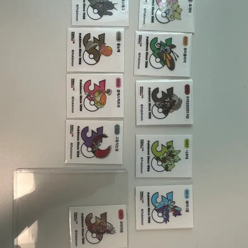 [BUNJANG] Pokemon 1013 Types Logo Stickers Bundle Set Including Koraidon (11 Types) / 포켓몬스터 1013종 로고 띠부씰 코라이돈 포함 11종 일괄 판매 및 교환