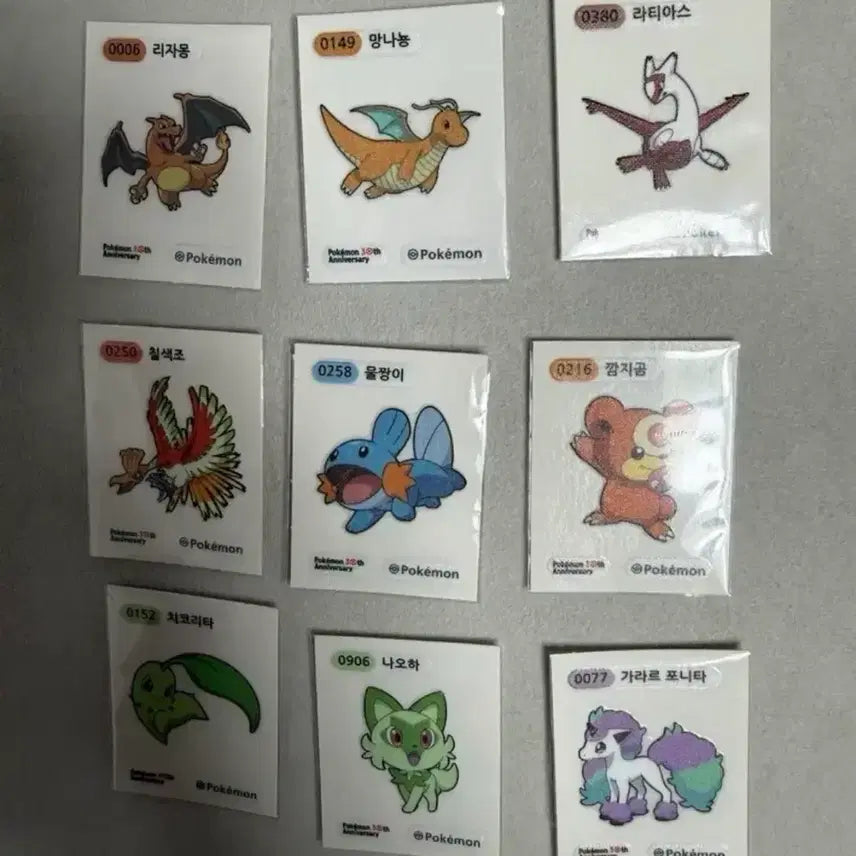 [BUNJANG] 30th Anniversary Pokemon Stickers - Charizard, Dragonite, Latias, Ho-Oh, Mudkip, Teddiursa, Rowlet / 30주년 포켓몬 띠부씰 리자몽 망나뇽 라티어스 칠색조 물짱이 깜지곰 나오하