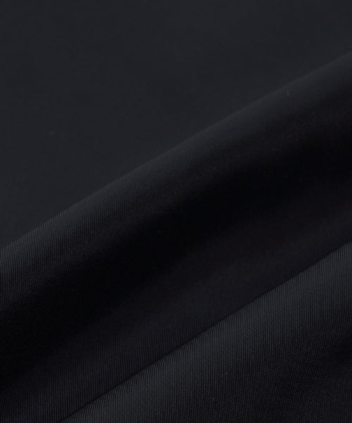 Nylon Front Cursive Varsity Jacket NYM (Black)